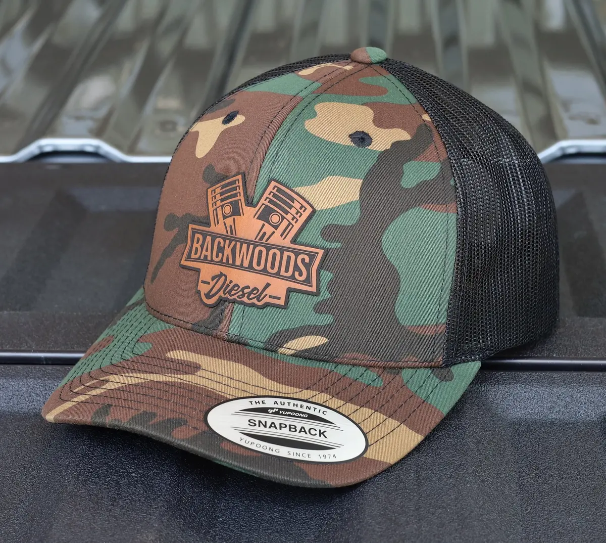 Backwoods Diesel Trucker Hat – Camo & Black Snapback With Leather Patch 1